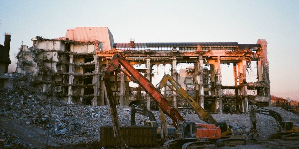 Excavator in a demolished site