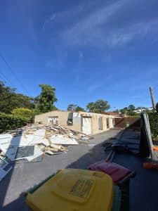 An empty space after house demolition, a blank canvas for future development.