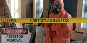 "Professional asbestos disposal in protective gear safely disposing of asbestos materials, following health and safety regulations