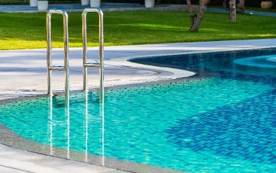 beautiful umbrella chair around outdoor swimming pool hotel resort holiday vacation travel