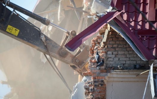 excavator destroys a house building reconstructio 2024 09 12 08 24 44 utc
