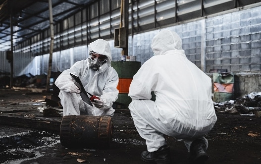 workers in protective suits inspect chemicals in a 2024 04 30 17 24 42 utc