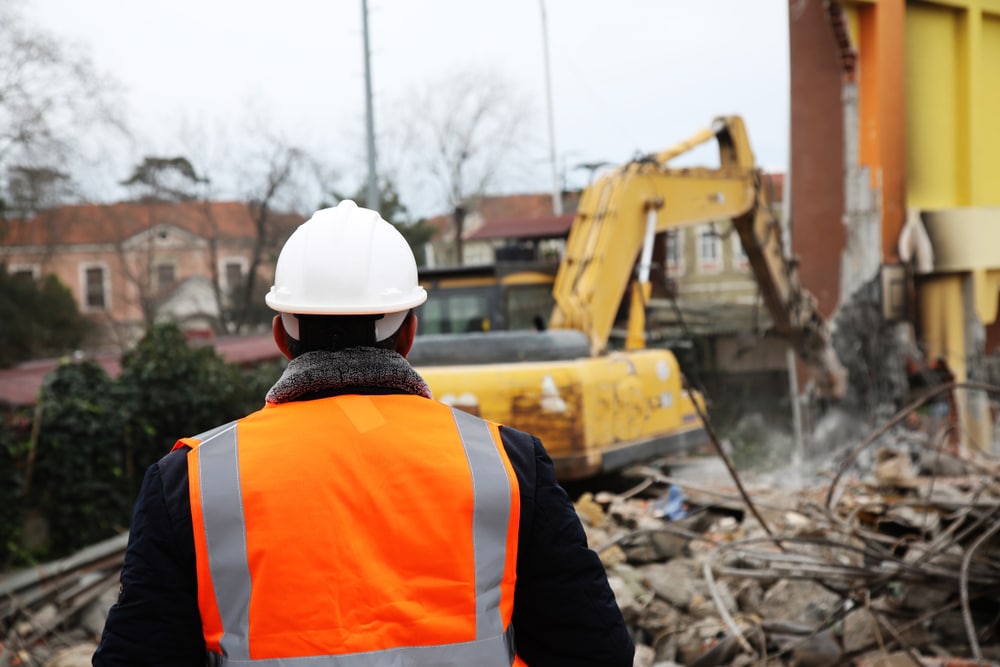 Engineer Controlling Outdoor Construction Site